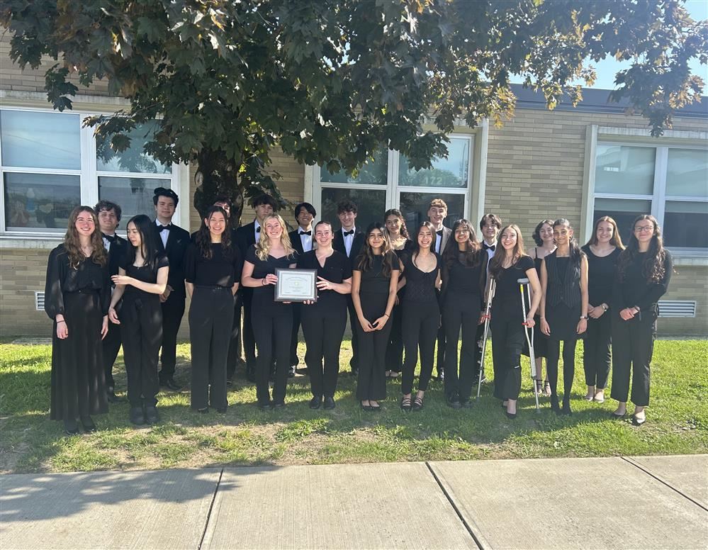  Fox Lane's Chamber Orchestra poses outside the school